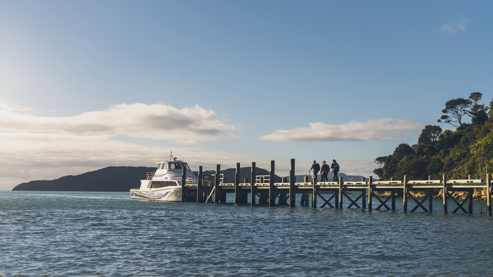 Cougar Line boat at jetty in the Marlborough Sounds, where the Queen Charlotte Track runs through.